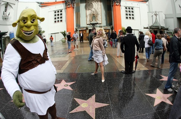 People dressed as movie characters pose