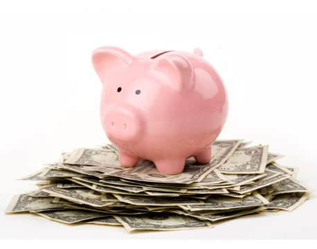 piggy-bank-on-money-de