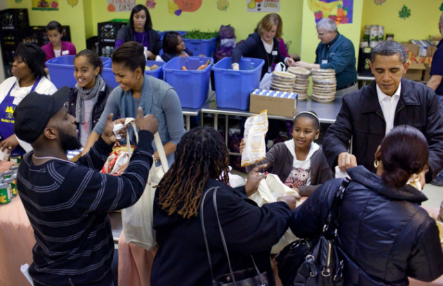 President Barack Obama, Along with First Lady Michelle and Daughters Sasha and Maila Pack Thanksgiving Groceries at Martha's Table, a DC Area Soup Kitchen