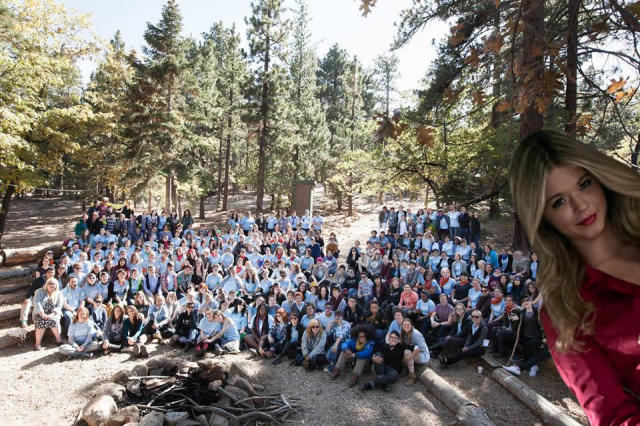 She's always screwing up the all-camp photo!