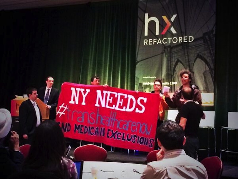 Protesters Take Stage at Health Conference Because NY’s Trans Healthcare Failure is Inexcusable