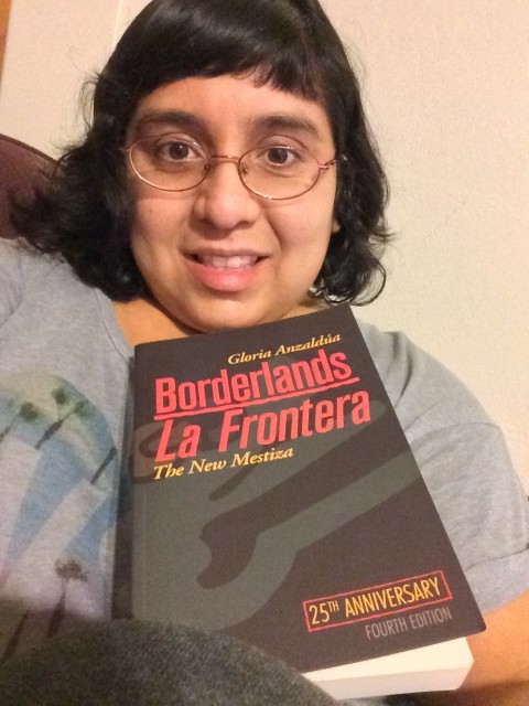 Maggie reading Borderlands.