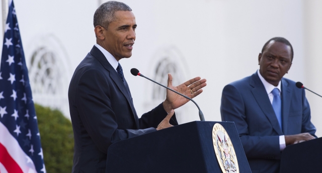 US President Barack Obama (L) and his Kenyan counterpart Uhuru Kenyatta give a joint press conference afteir their talks at the State House in Nairobi on July 25, 2015. In a joint press conference after talks with Kenyan President Uhuru Kenyatta, Obama pushed a tough message on Kenyan corruption, the civil war in South Sudan, controversial elections in Burundi and the fight against Somalia's Al-Qaeda-affiliated Shebab militants. AFP PHOTO / SAUL LOEB (Photo credit should read SAUL LOEB/AFP/Getty Images)