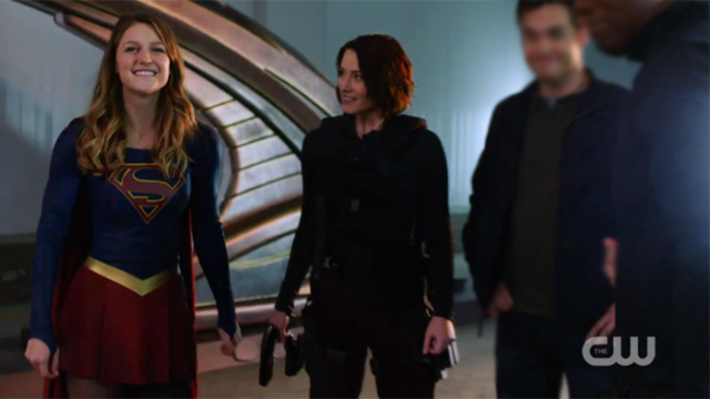 Kara beams while Alex looks on proudly