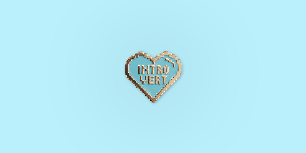Introvert Enamel Pin / Description: 8-bit heart of rose gold with blue enamel.