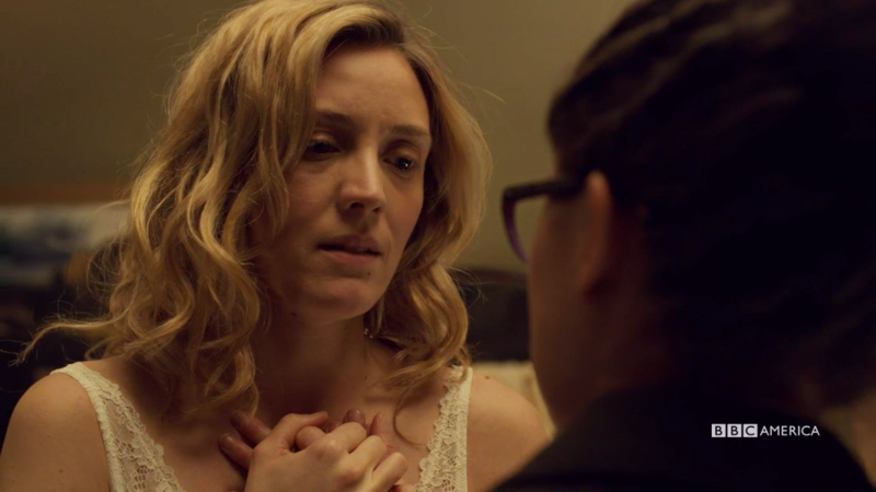 Delphine holds COsima's hand over her heart again