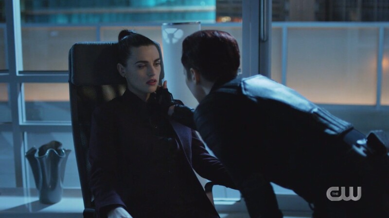 Alex checks Lena's pulse