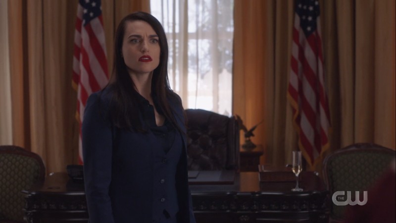 Lena stands in the oval office