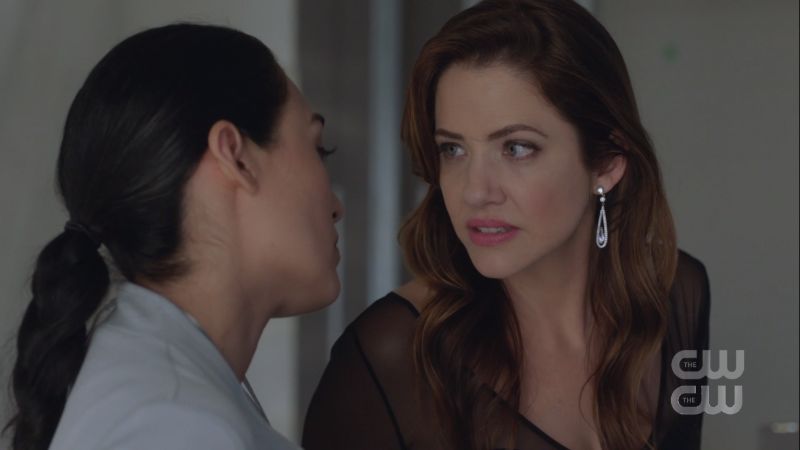 Andrea looks at her assistant closely