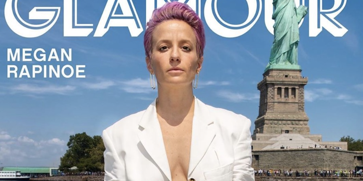 No Filter: Megan Rapinoe In a White Blazer on a Boat Upstages Large Green Statue