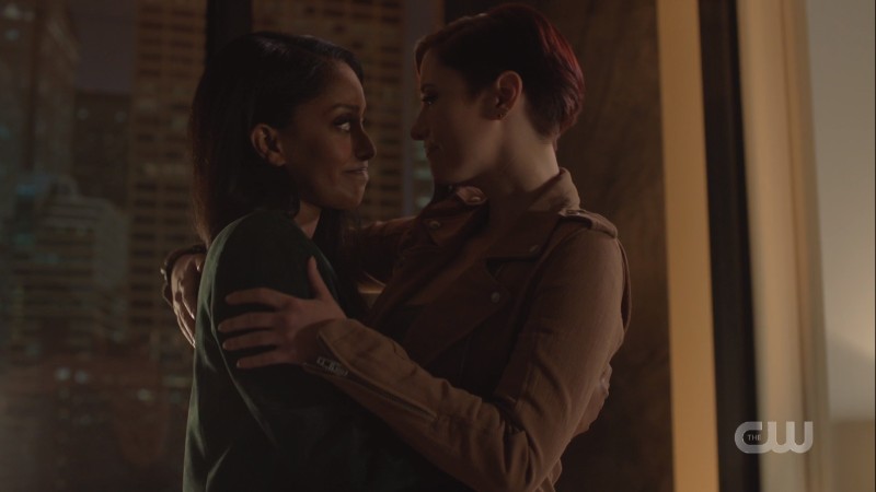 Alex and Kelly hold each other
