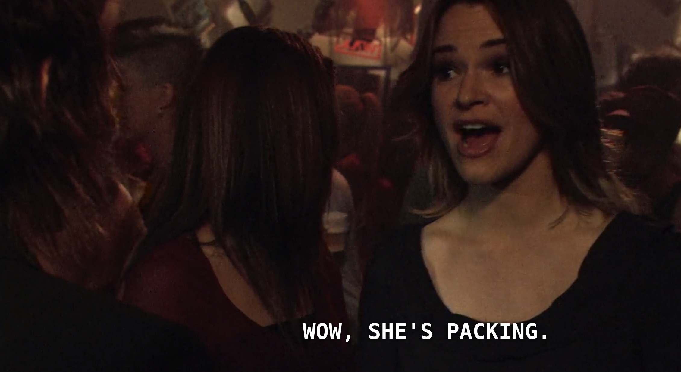 Alice (and her new vampire girlfriend, Uta) are at a crowded dance party at Shane's skate shop. Alice is wearing a u-shaped black top and sees Jenny and Max dancing closely with each other. Alice says, "Wow, she's packing."