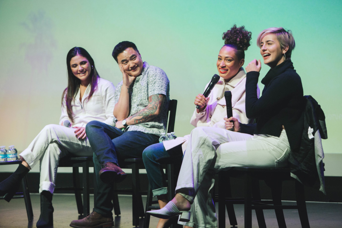 The cast of Generation Q sits on stage. From left to right: Arienne Mandi (Dani), Leo Sheng (Micah), Rosanny Zayas (Sophie) and Jacqueline Toboni (Finley).