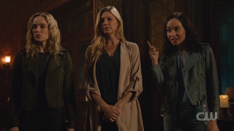 nora points at her friends