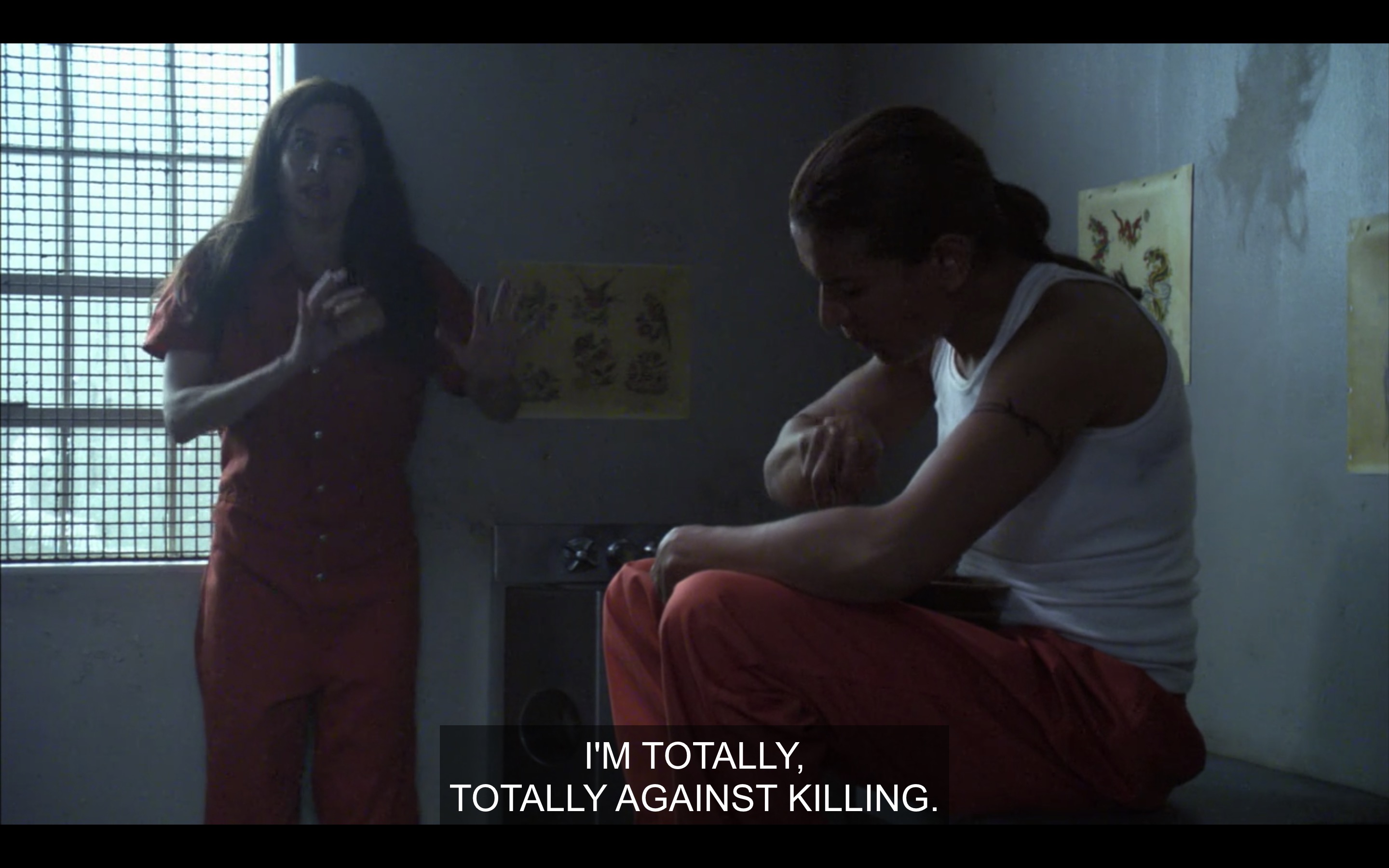 Helena and Dusty in a jail cell, Dusty sitting and eating, Helena standing looking nervous, saying "I'm totally totally against killing."