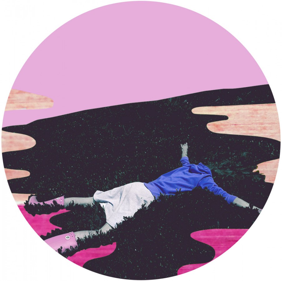 girl lying facedown in the grass