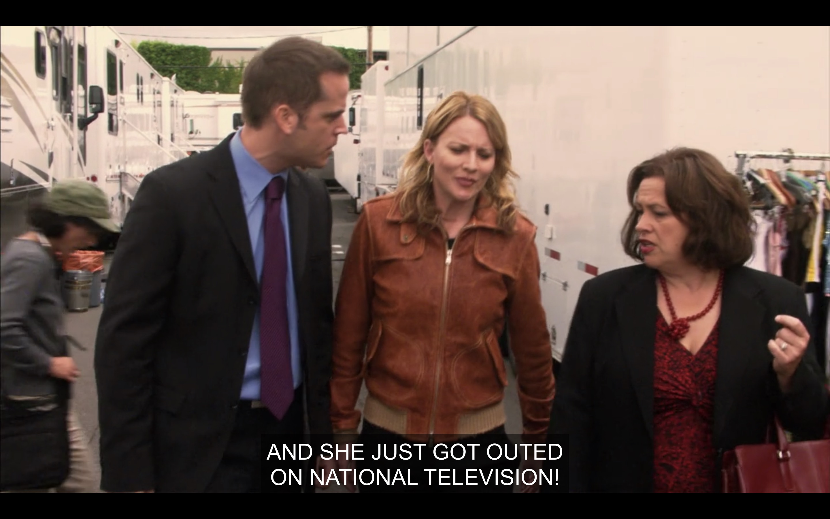 Tina talking to Niki's managers