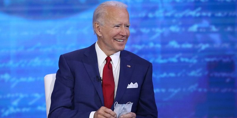 Joe Biden shows off his mask during his town hall event, 