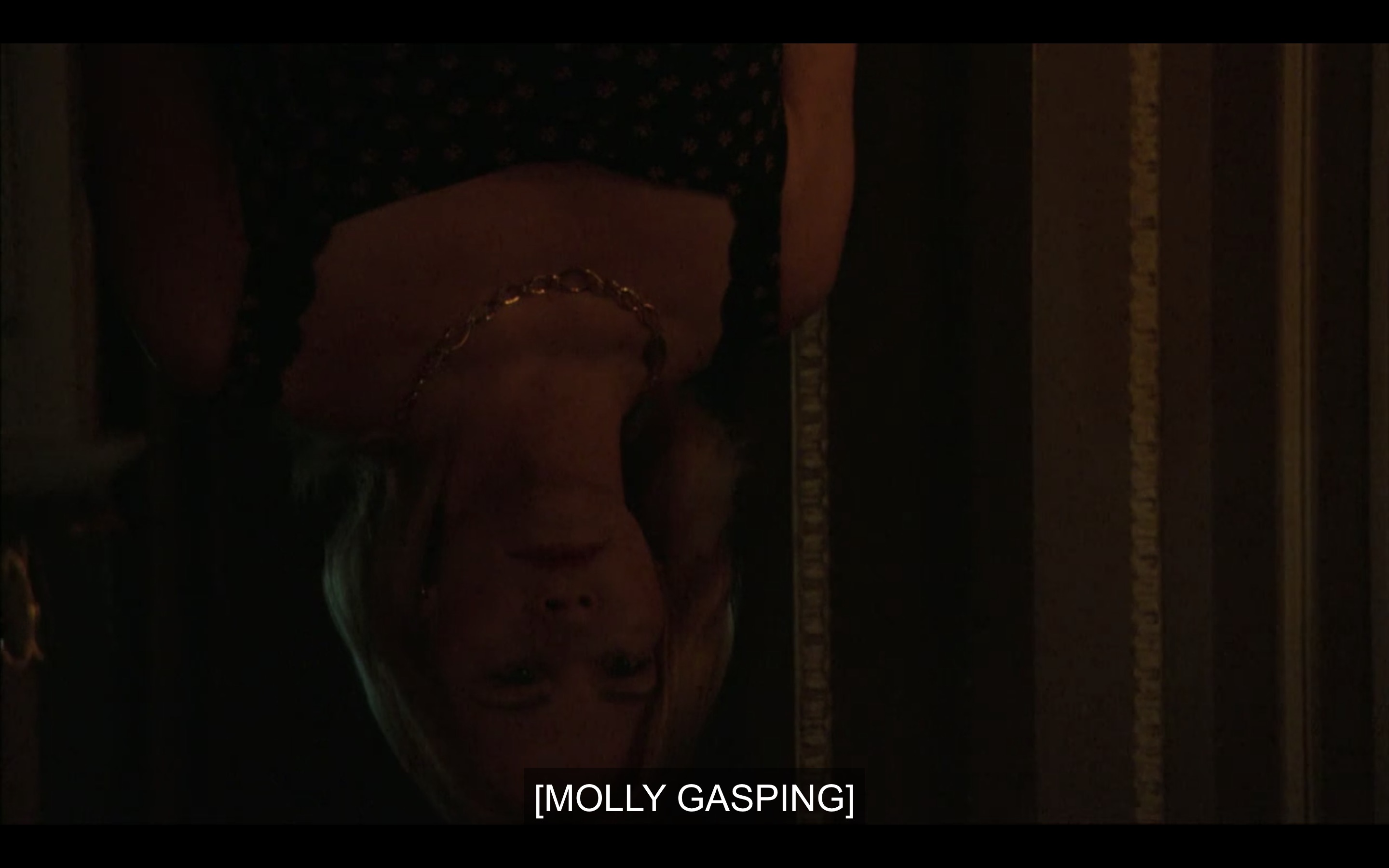 Upside-down Phyllis's head as Molly sees it