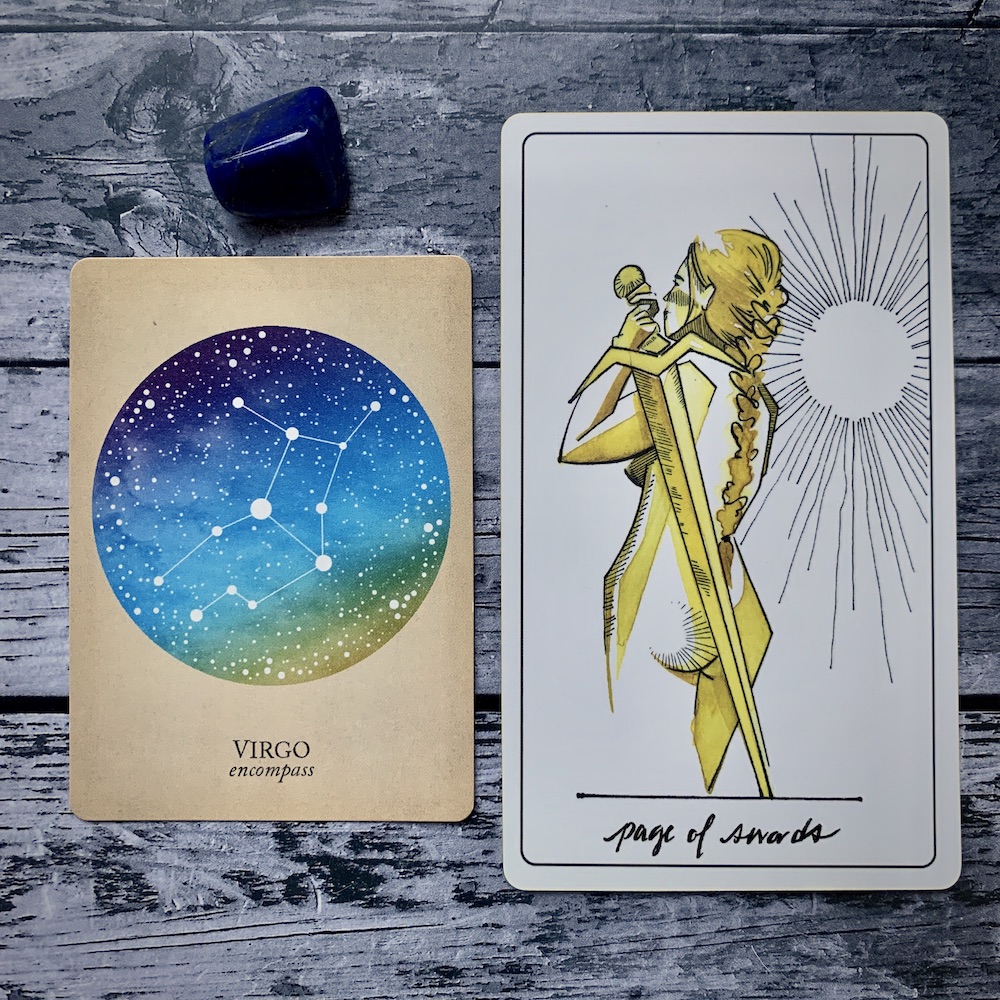 the Virgo card from the Constellations deck and the Page of Swords card