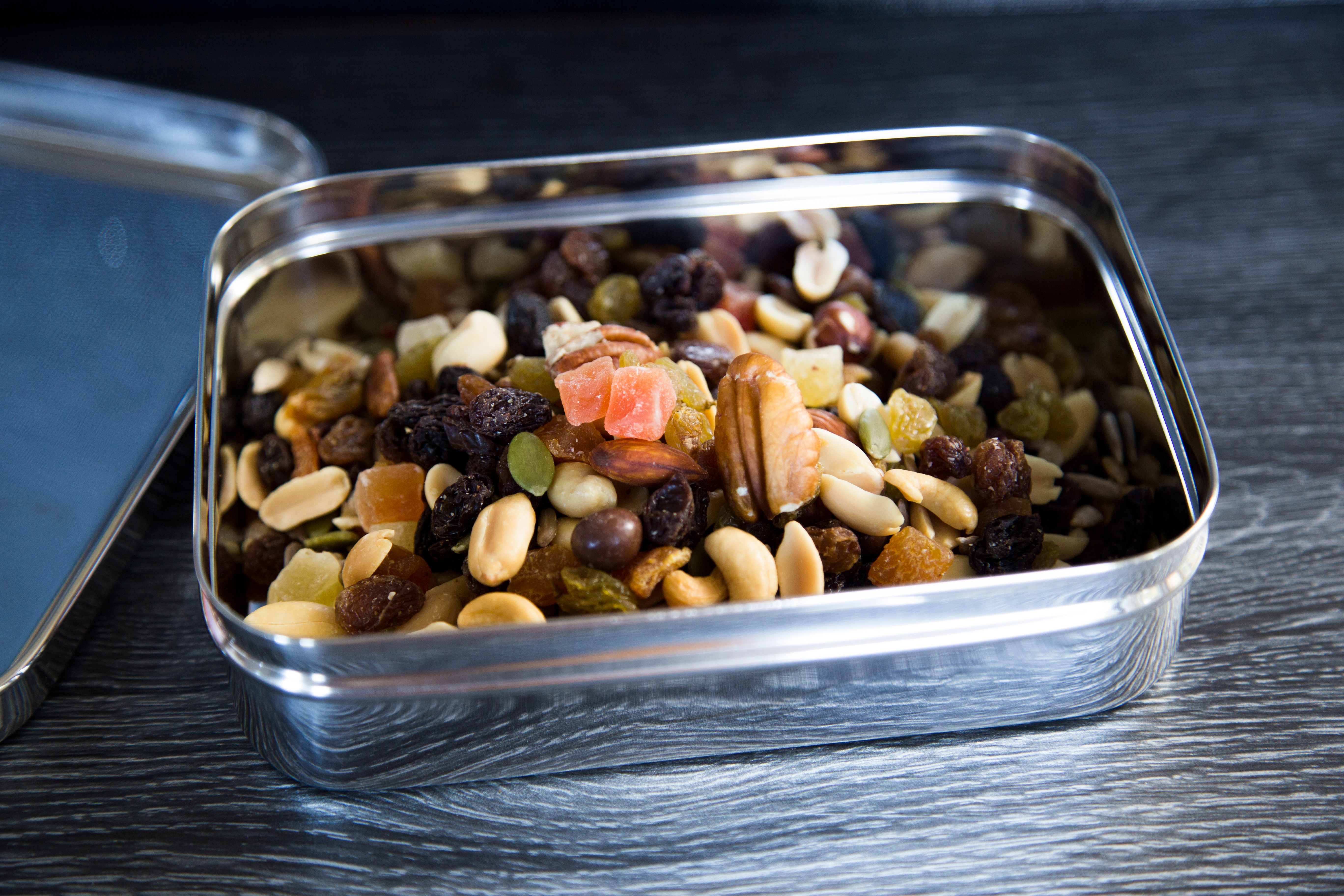 A tin containing mixed nuts and dried fruit