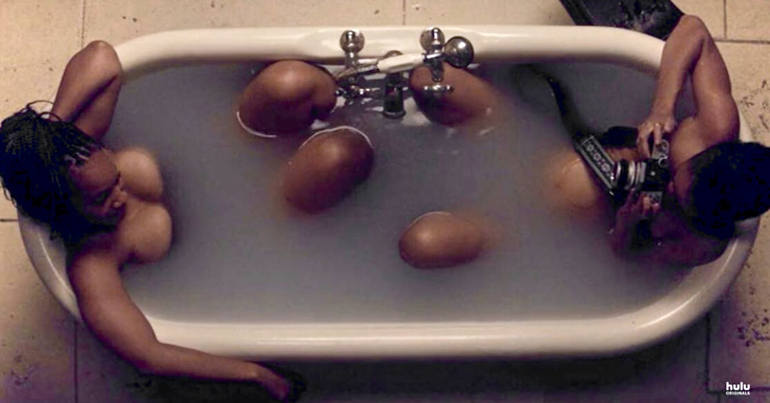 Paula and Mia in the bathtub in Little Fires Everywhere.