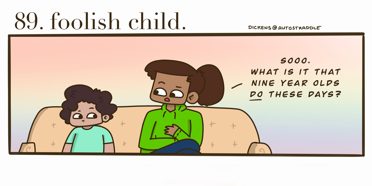 A small brown child sits on the couch with their aunt. The child is in a turquoise shirt and the aunt is in a green hoodie with a ponytail. She asks the child, 