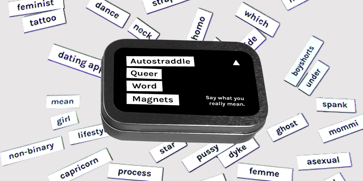An Autostraddle Queer Word Magnet kit sits on an array of queer words, including boyshorts, spank, mommi, asexual, femme, and mean.