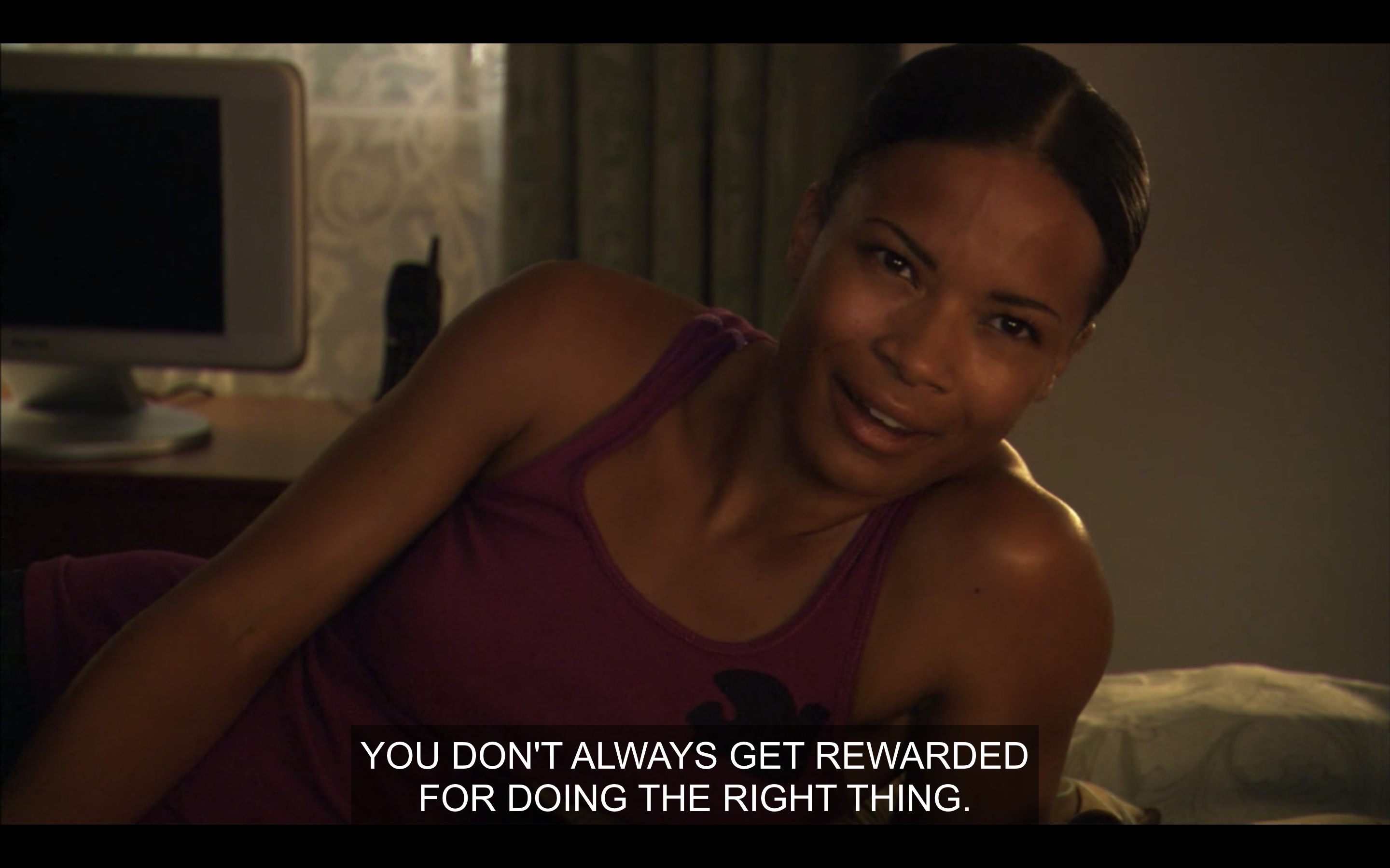 Tasha looking hot in a tank top telling Alice that you don't always get rewarded for doing the right thing