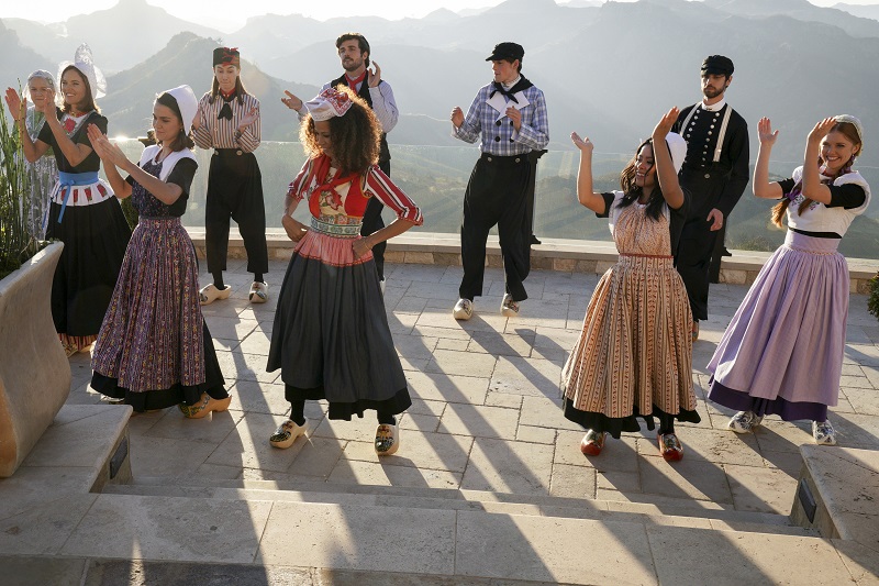 The Adams Fosters and the Hunters practice Dutch folk dancing.
