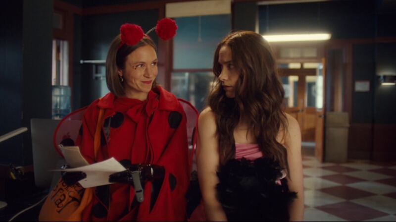 Waverly smiles mischievously at her wary sister.