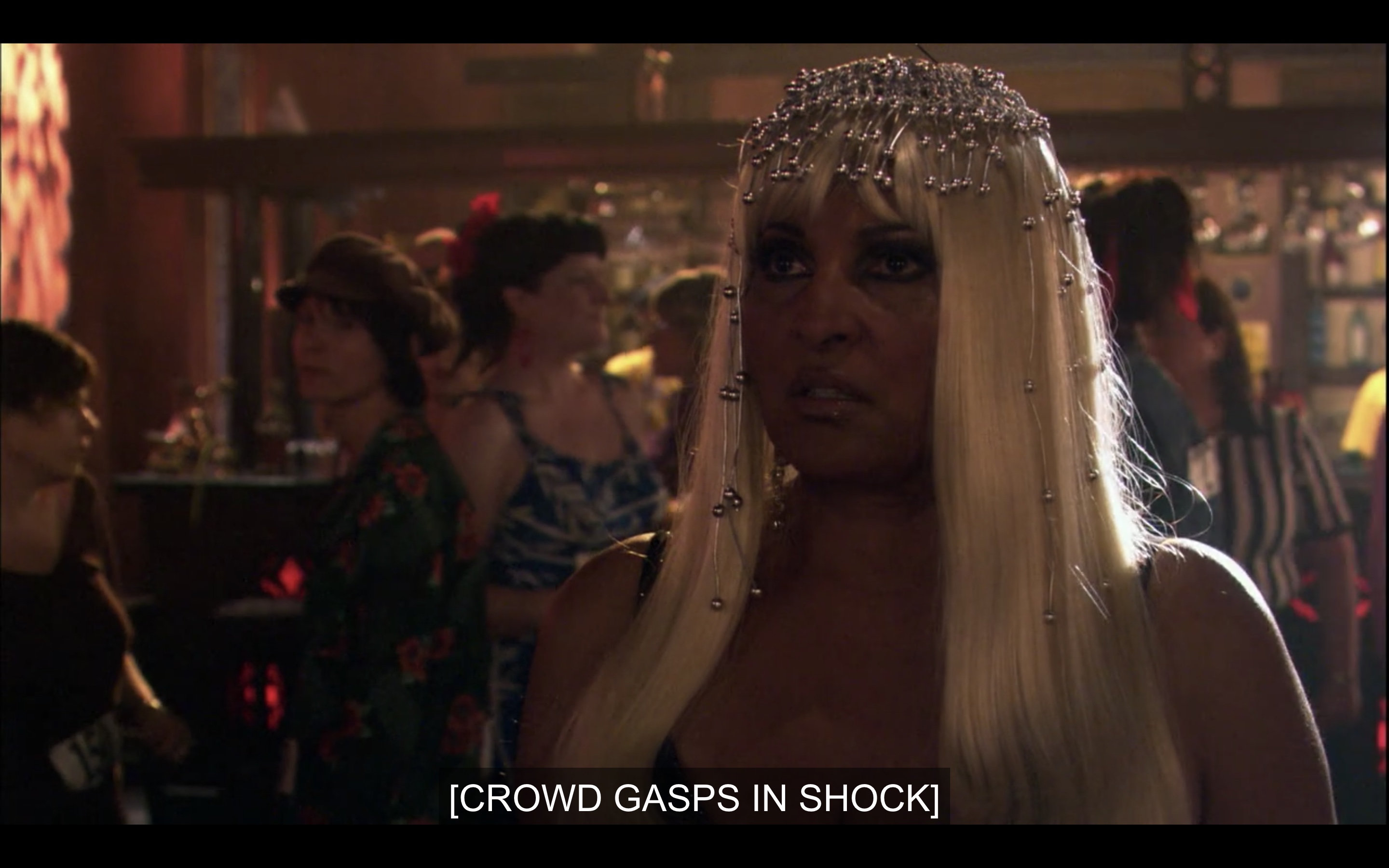 Kit in a Cleopatra get-up in the audience as "crowd gasps in shock"