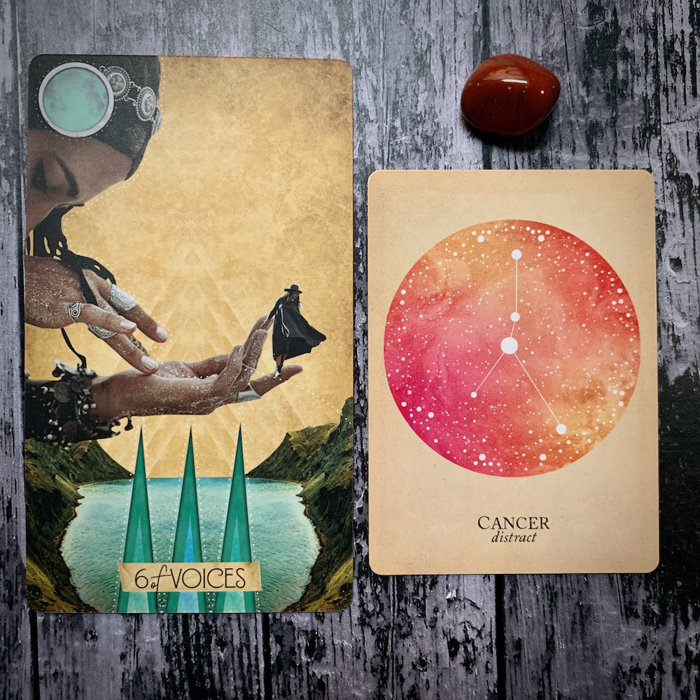 A tarot card for the 6 of voices, with a woman bowed over a body of water holding a small figure in her hand, a constellation card for Cancer: Distract; and a red crystal