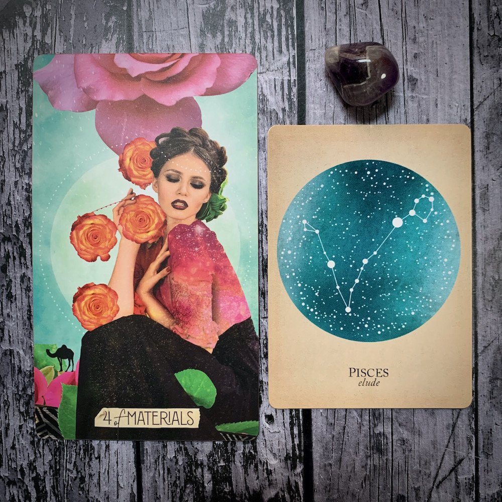 A tarot card for the 4 of Materials, featuring a woman in glamorous makeup clutching four blooming roses sensually; a constellation card reads Pisces: Elude, with a vareigated gray and black crystal