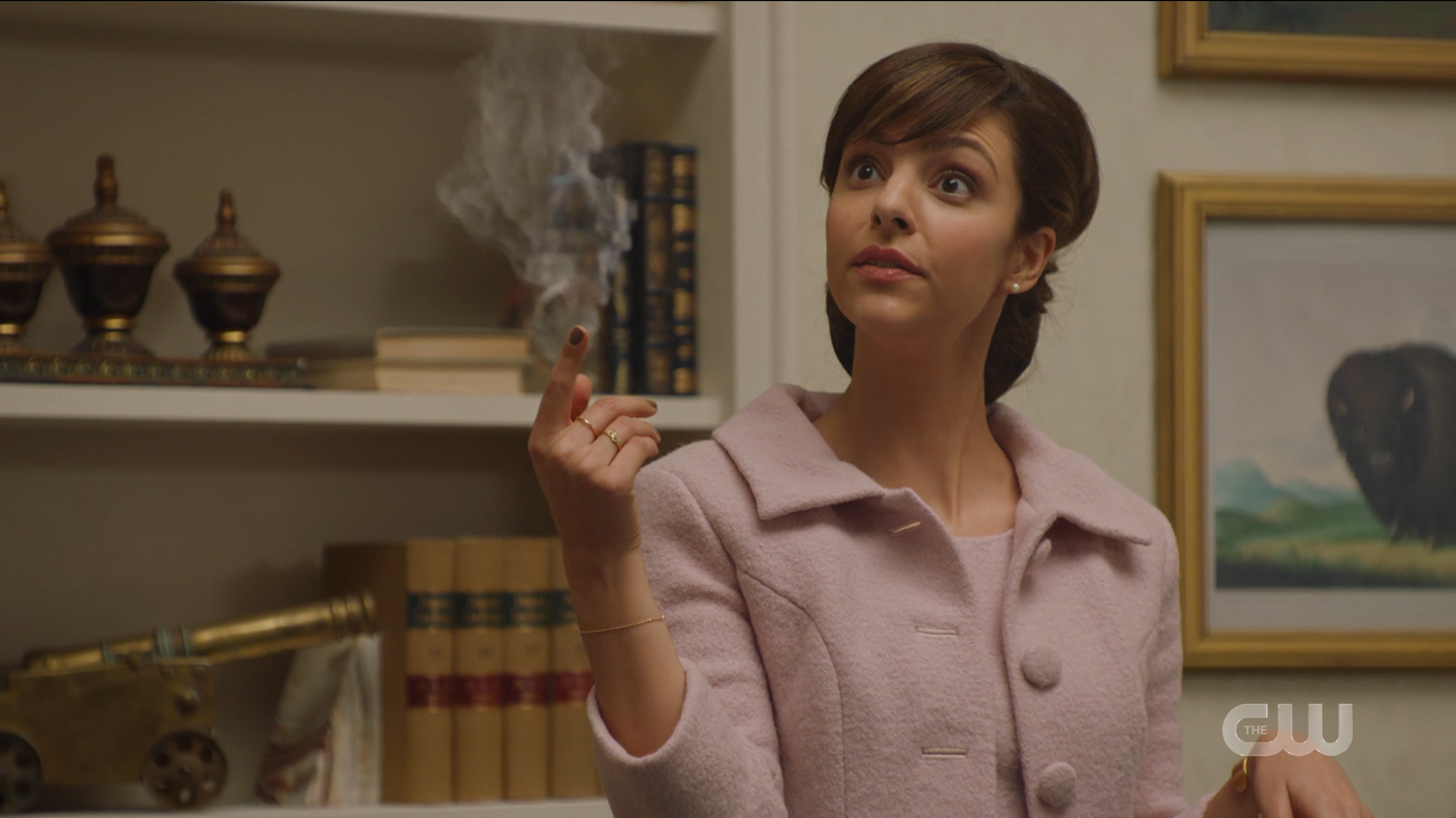 Zari twirls her wind around looking a bit bored.