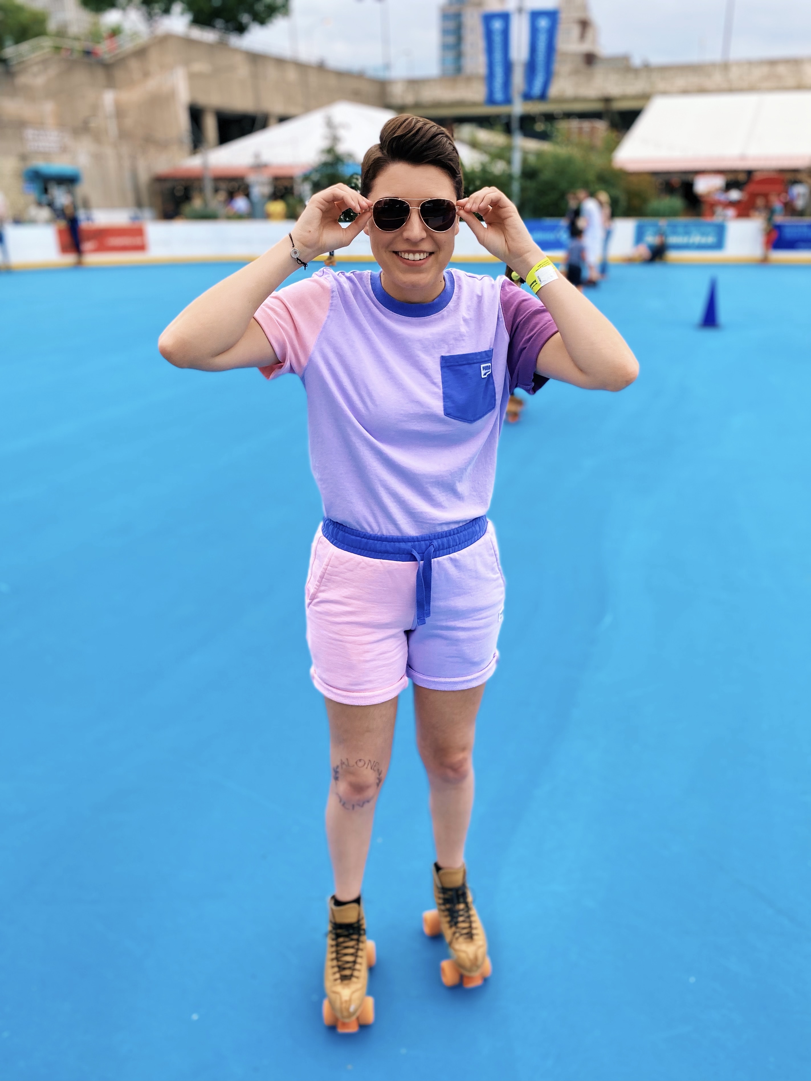 Jackie in rollerskates and sunglasses