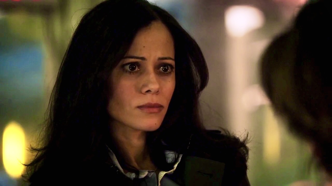 Victoria Cartagena as Renee Montoya in the tv show "Gotham" in a close up staring into the camera