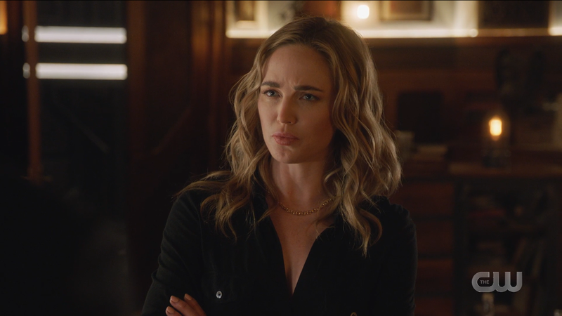 Sara gives Bishop a disapproving look