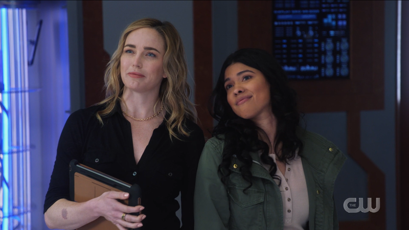 Sara and Spooner smirk