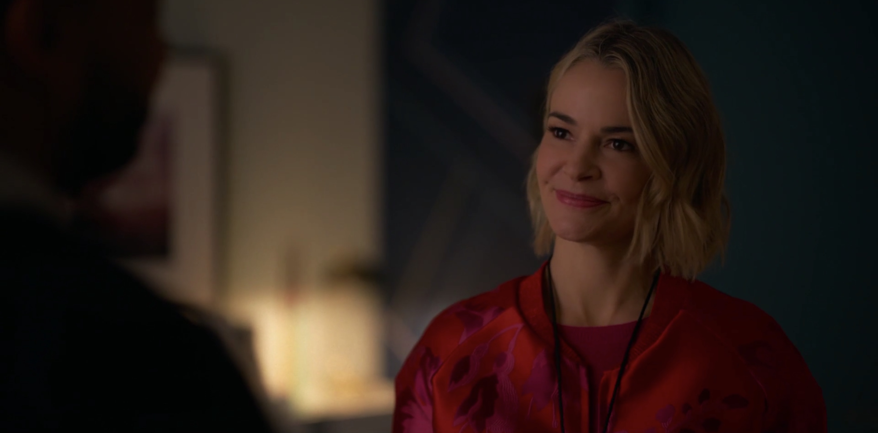 Alice smiling at Tom