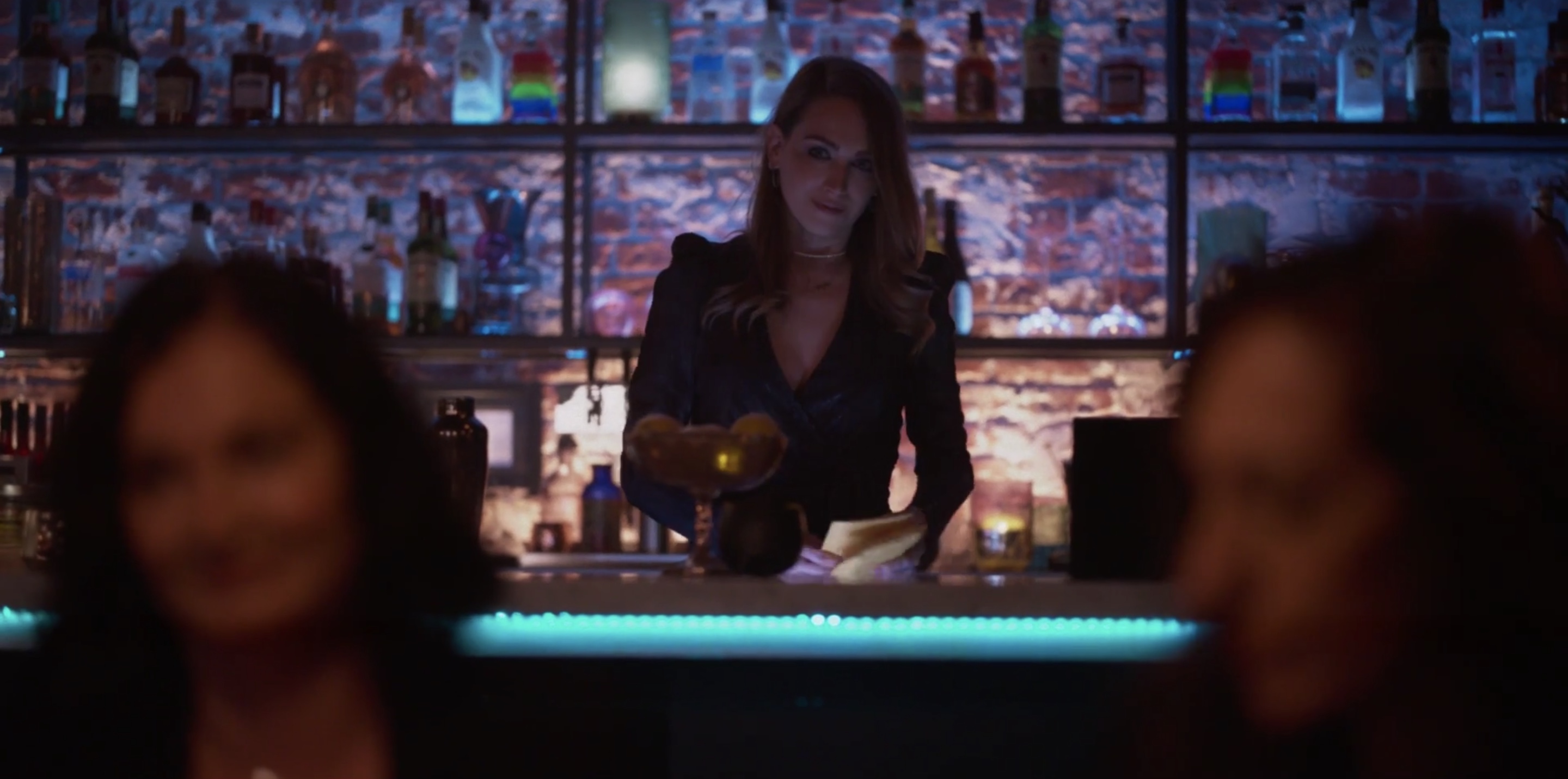 Tess looking out at the bar