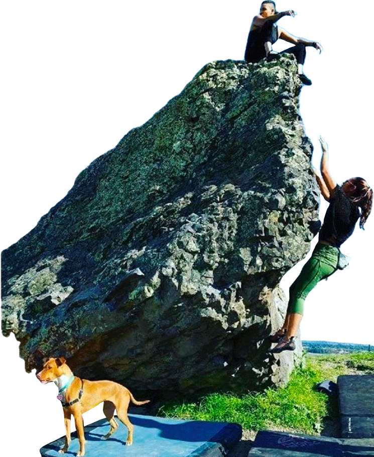 Abeni (seated at top of boulder) enjoys the view on a QTPOC climbing trip