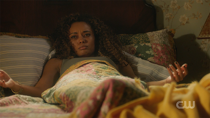 Astra looks confused in bed