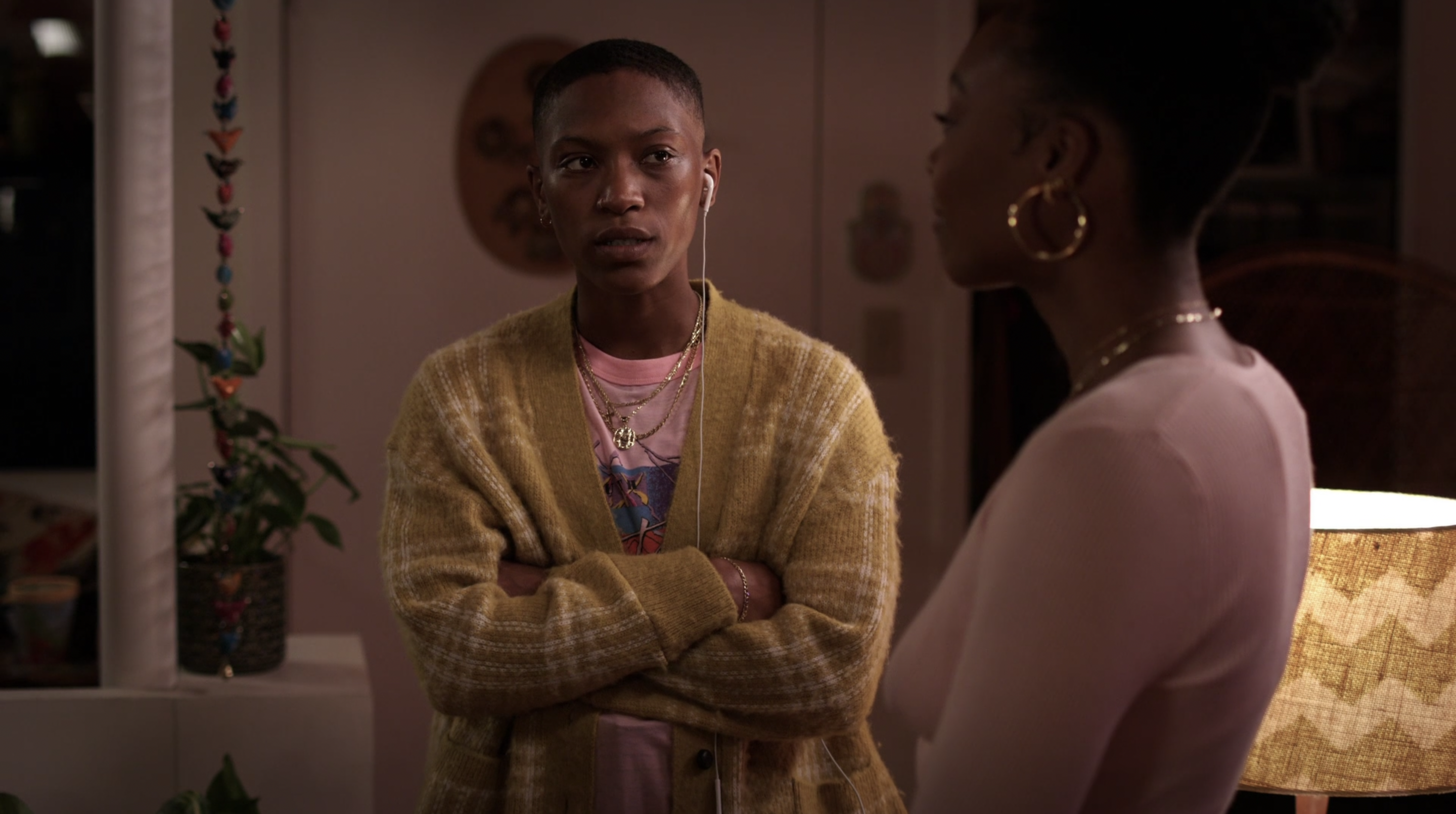 Twenties recap: Hattie is in a yellow sweater, looking skeptically