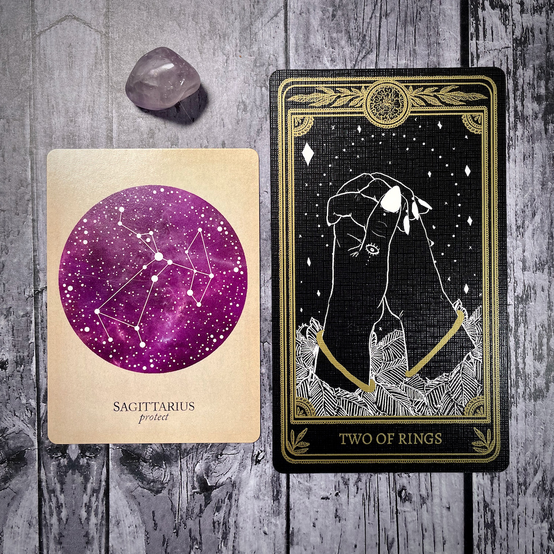 two of rings/pentacles from the marigold tarot