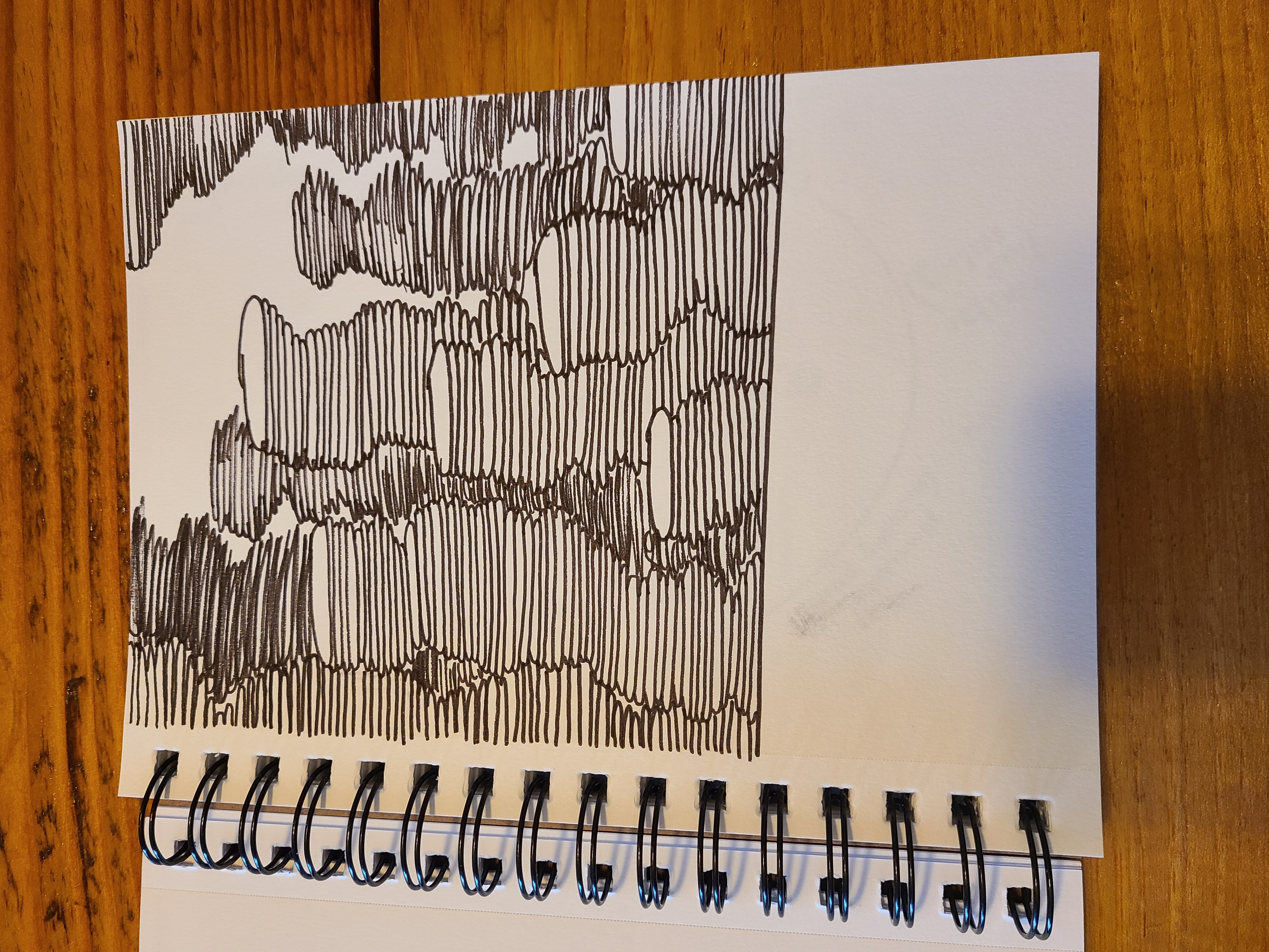 This is a sketch book sketch of endless stacks of pancakes.