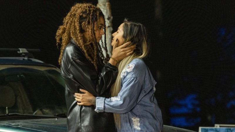 Olivia and Cara from Two Sentence Horror Stories hold each other pre-kiss