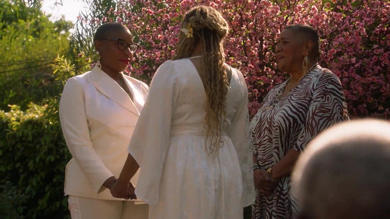 Toni presides over the marriage ceremony for Hen and Karen.