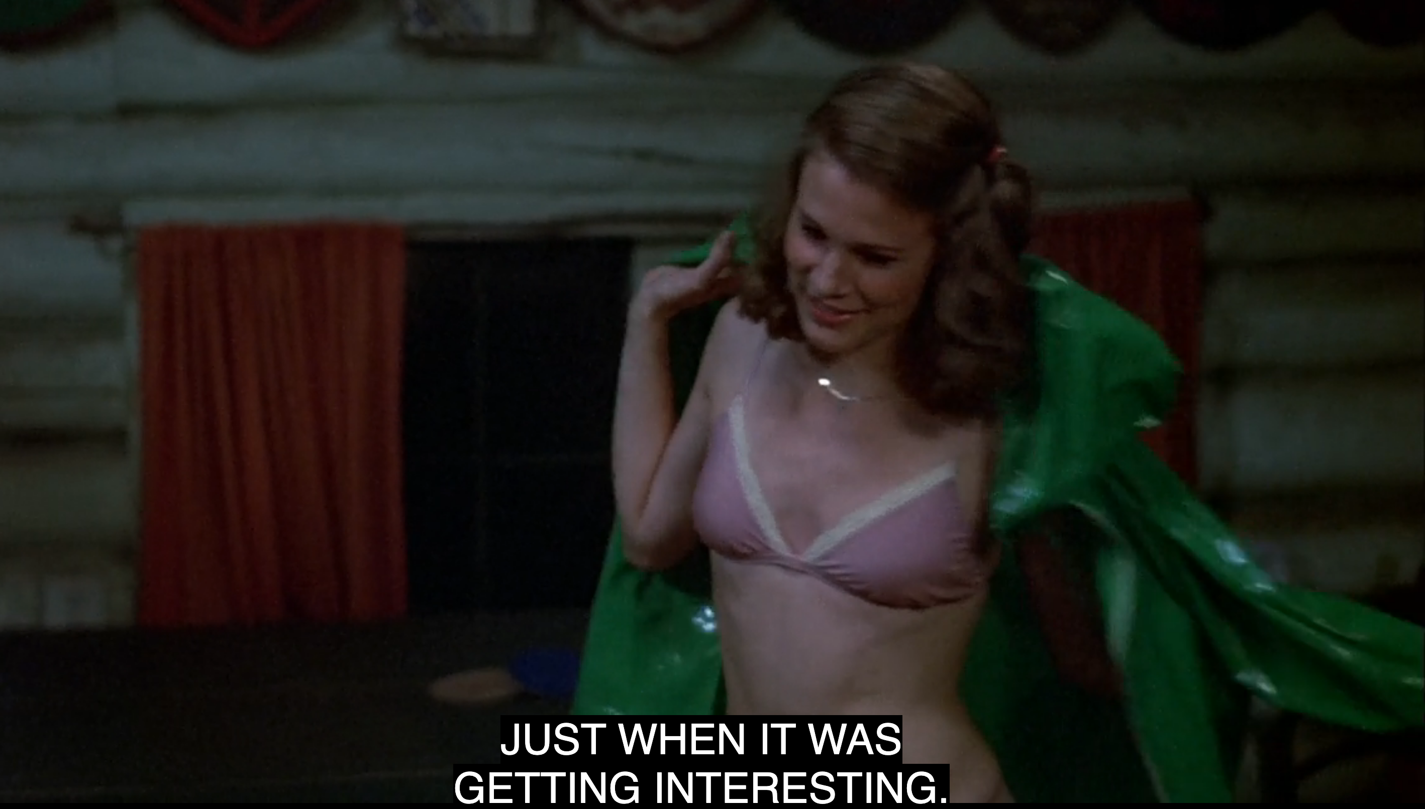Brenda says "just when it was getting interesting" while putting on a green raincoat in a cabin in Friday the 13th
