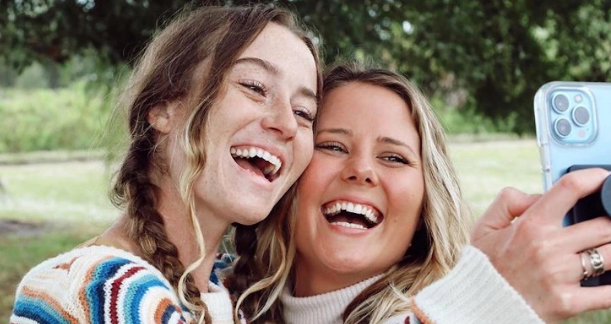 two white women taking a selfie together